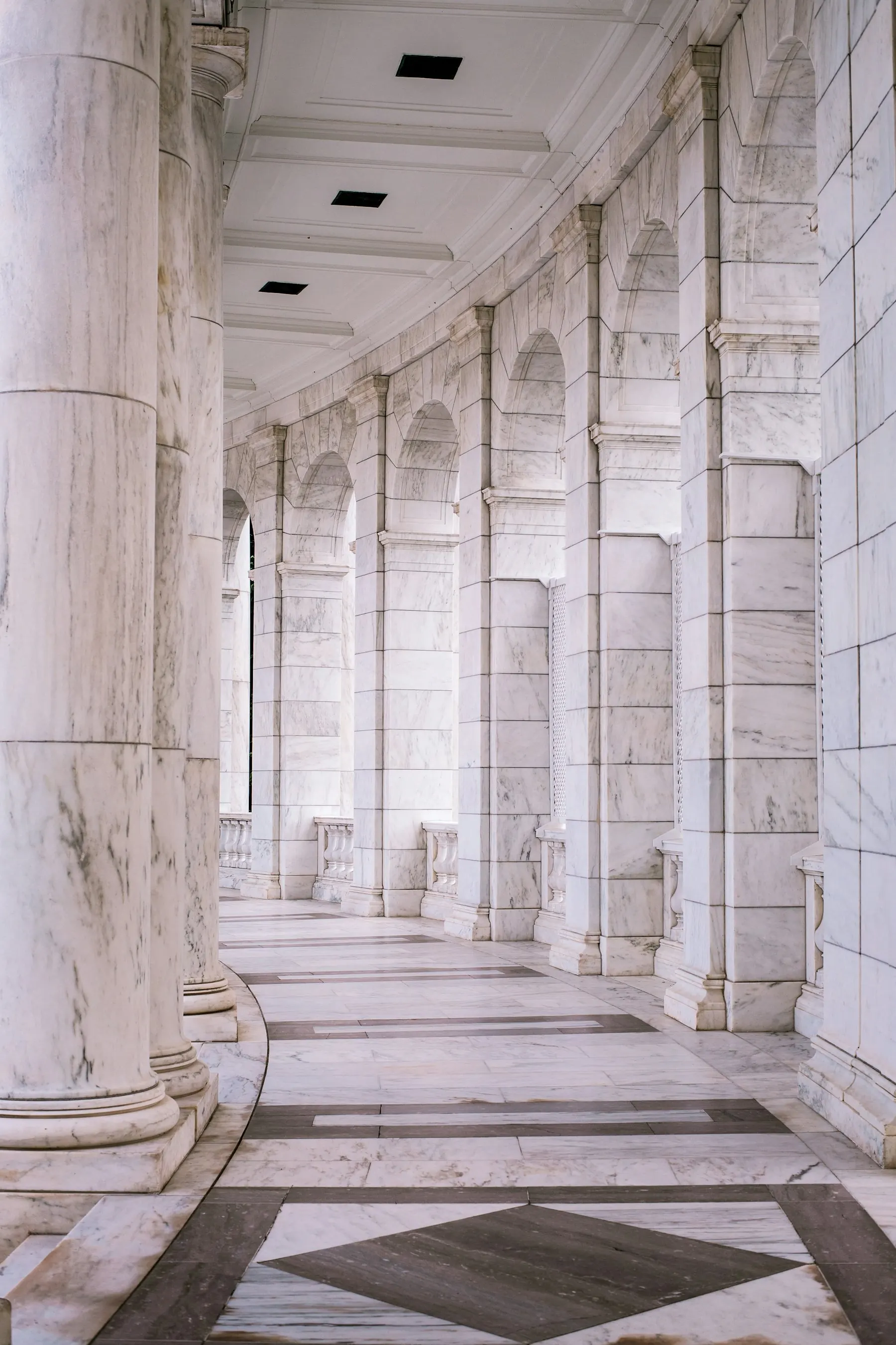 Marble arcade receding in perspective
